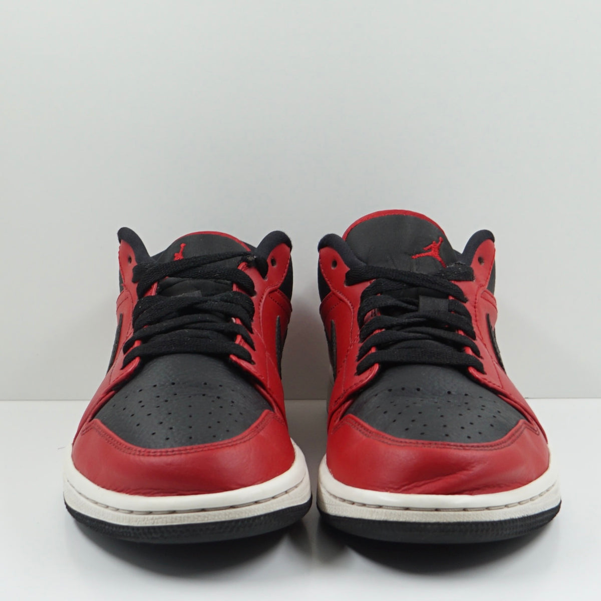 Jordan 1 Low Reverse Bred Pebbled Swoosh