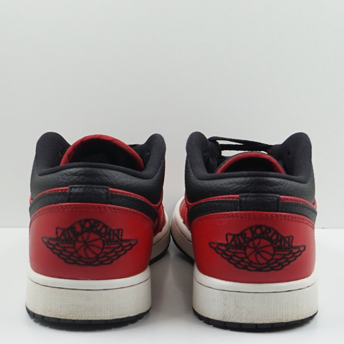 Jordan 1 Low Reverse Bred Pebbled Swoosh