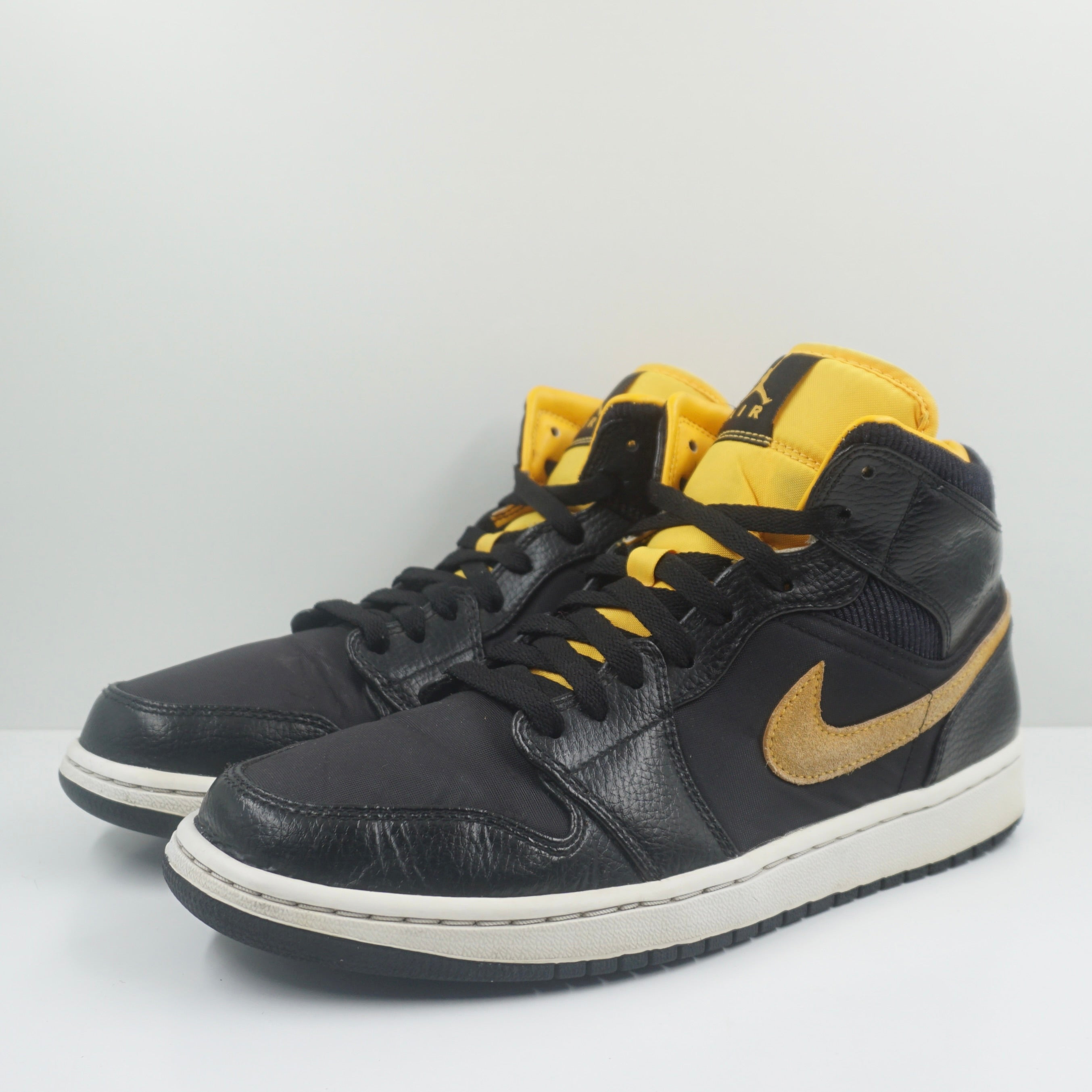 Jordan 1 Mid Black University Gold
