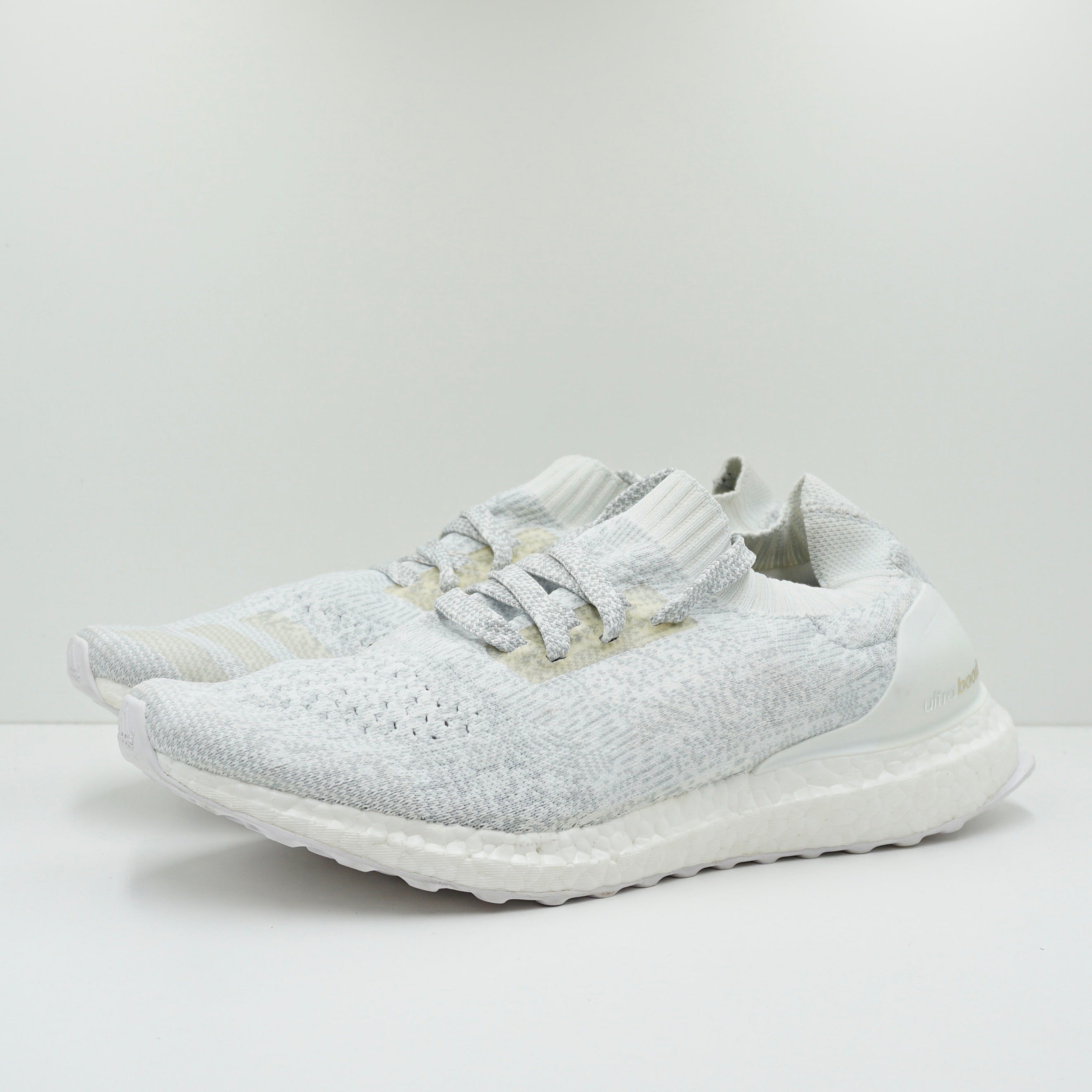ultra boost uncaged triple white