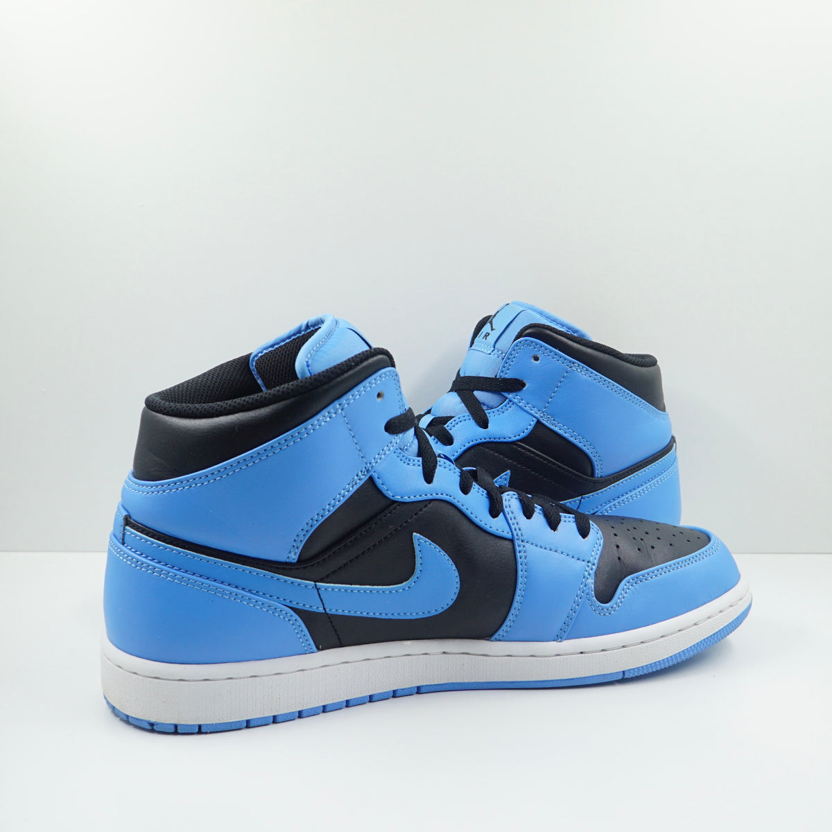 Jordan 1 Mid University Blue Black