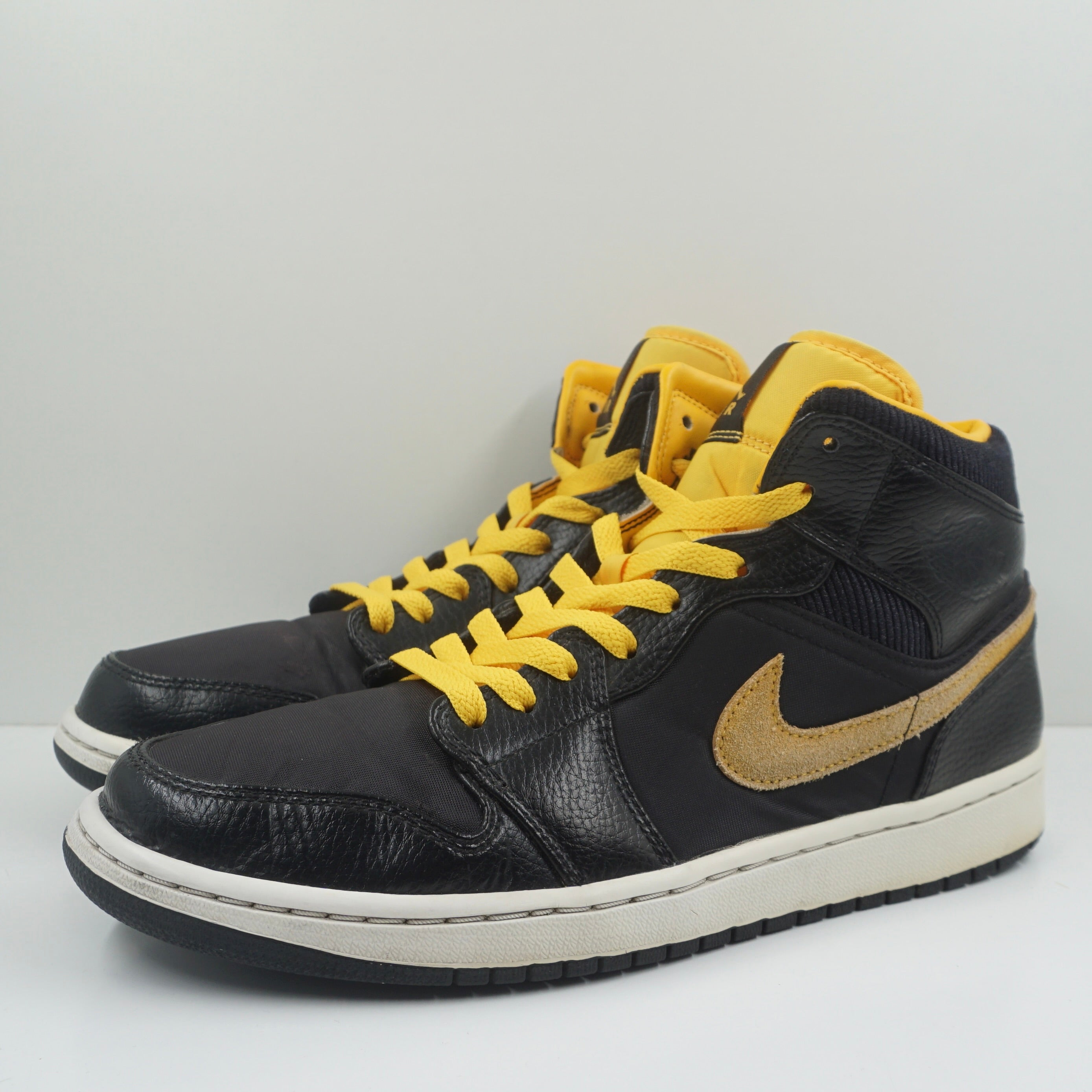Jordan 1 Mid Black University Gold
