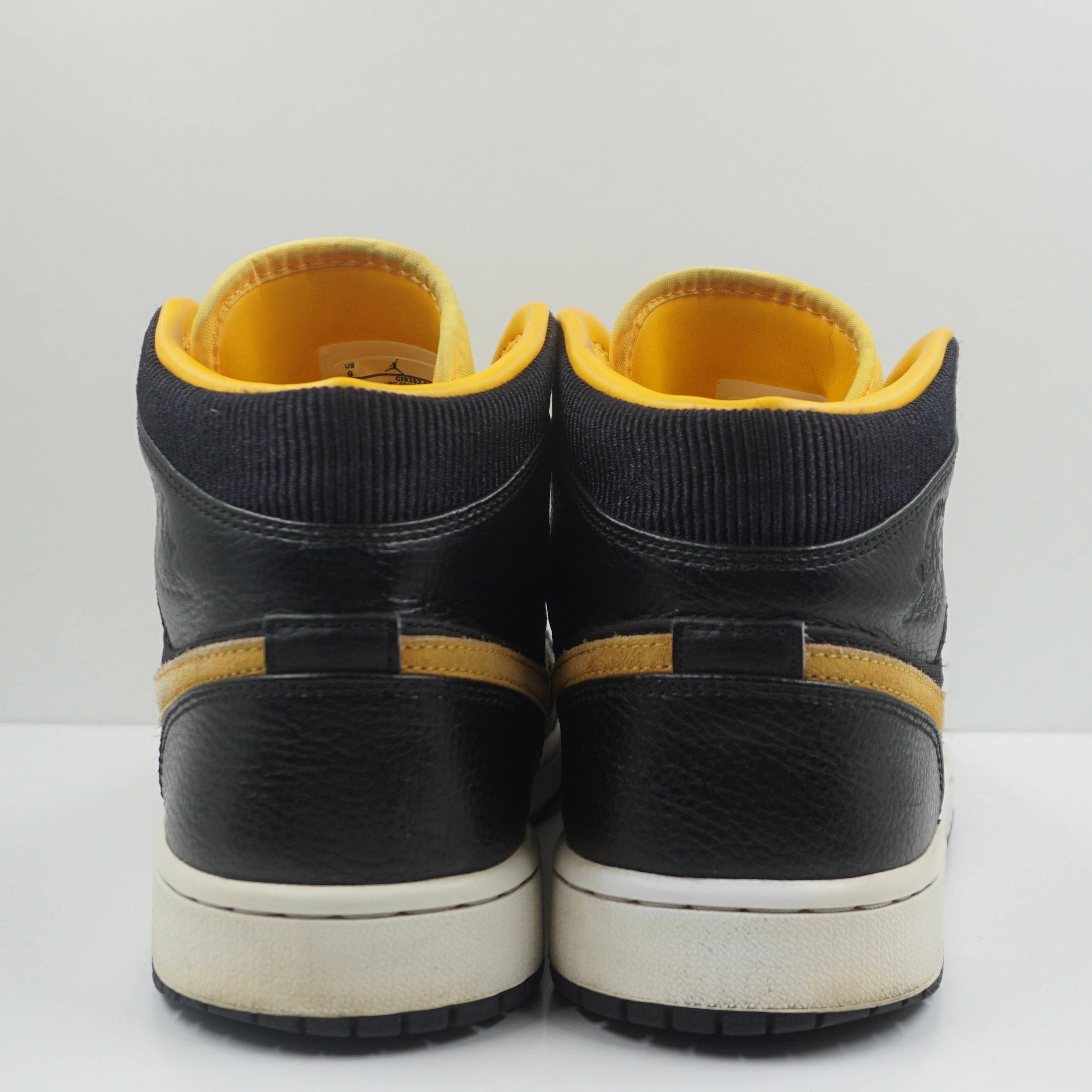 Jordan 1 Mid Black University Gold