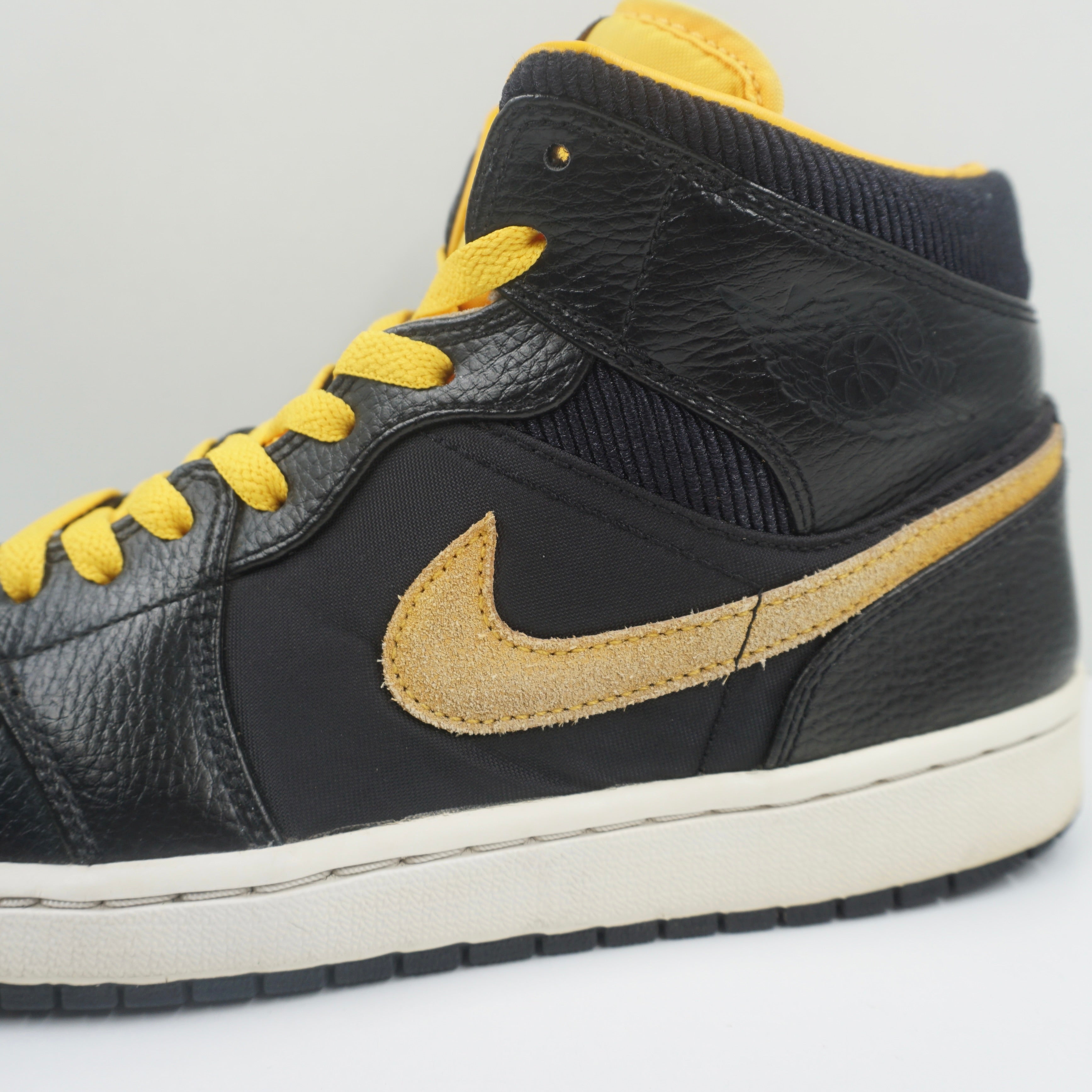 Jordan 1 Mid Black University Gold