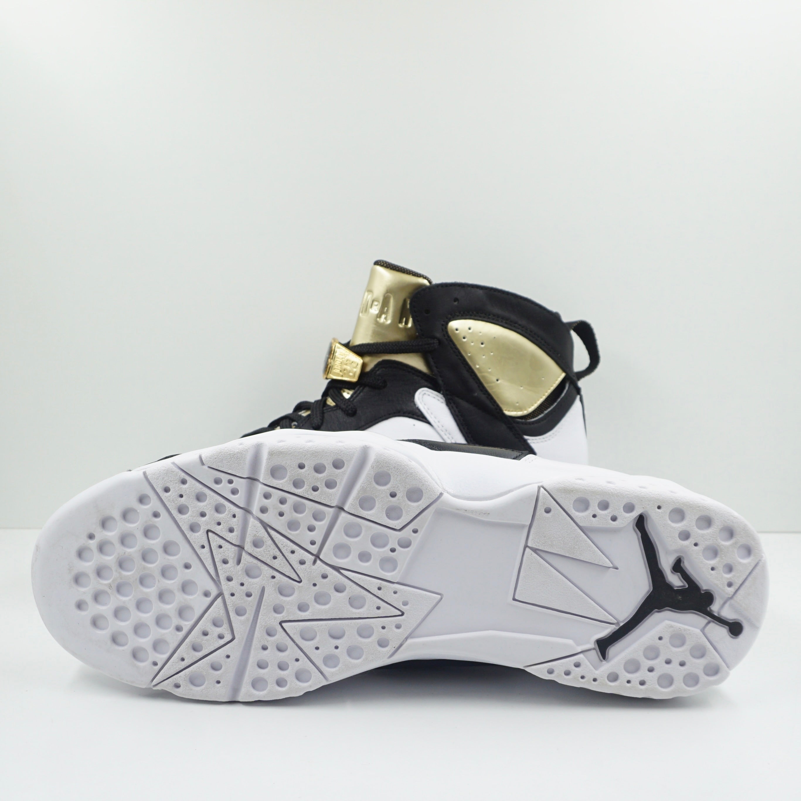 gold and white jordan 7
