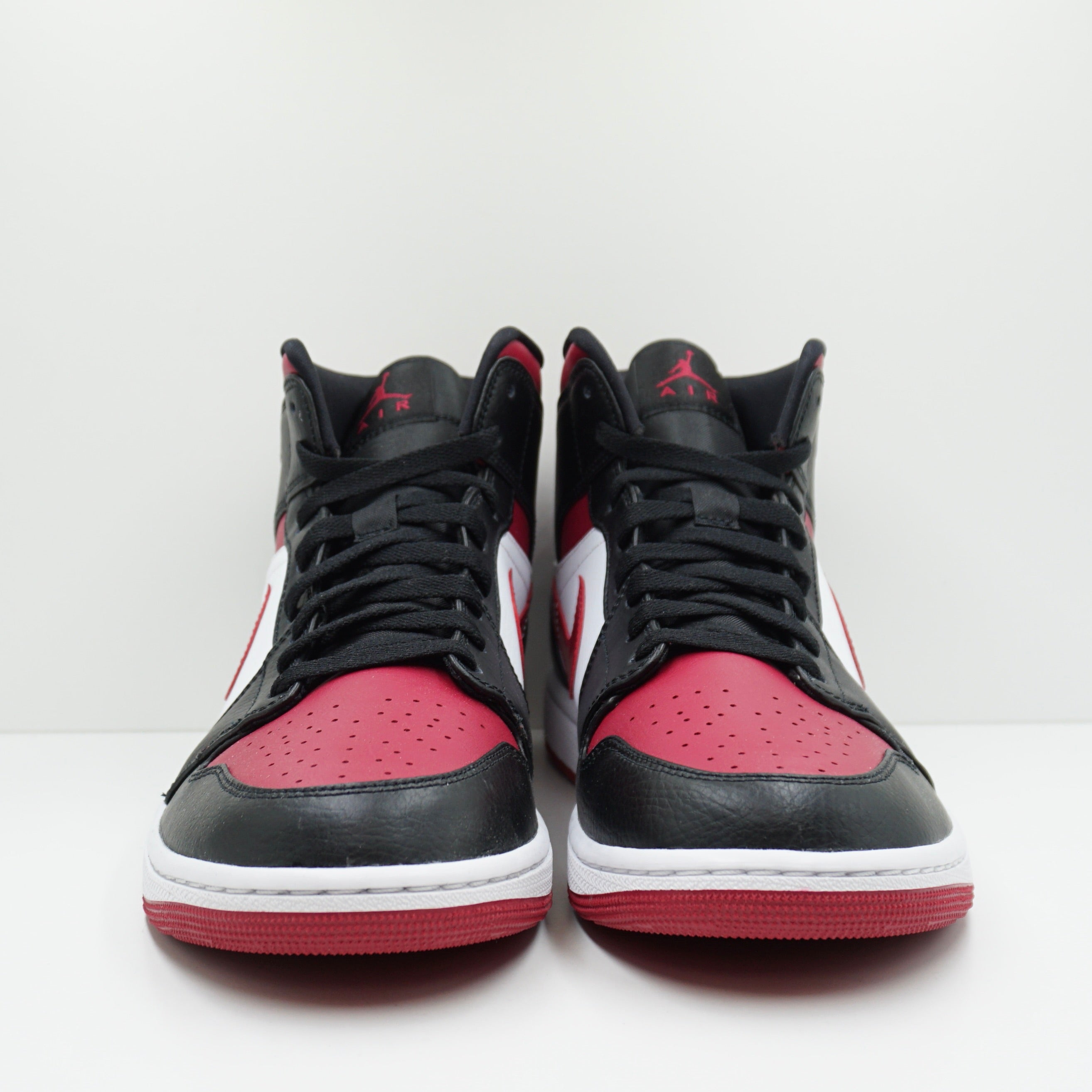 Jordan 1 Mid Bred Toe