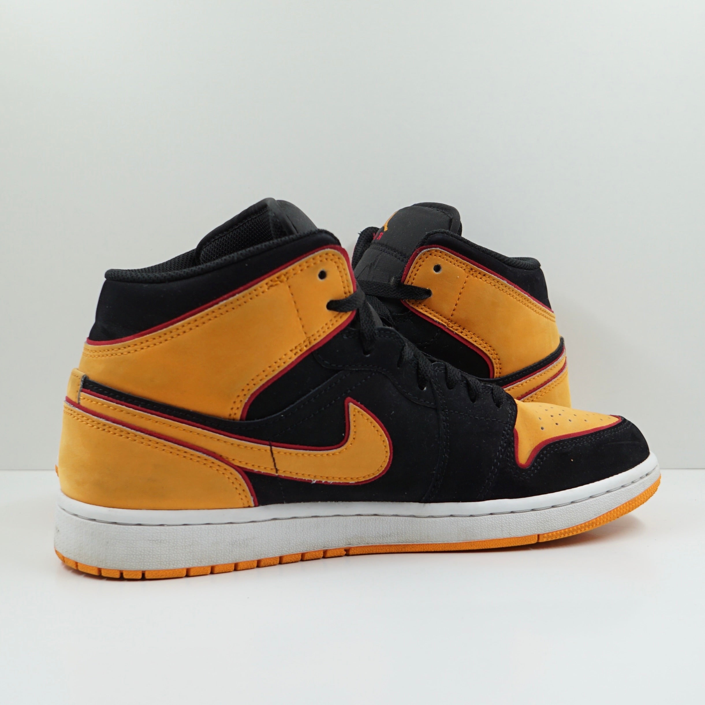Jordan 1 Mid Fat Tongue Black Orange