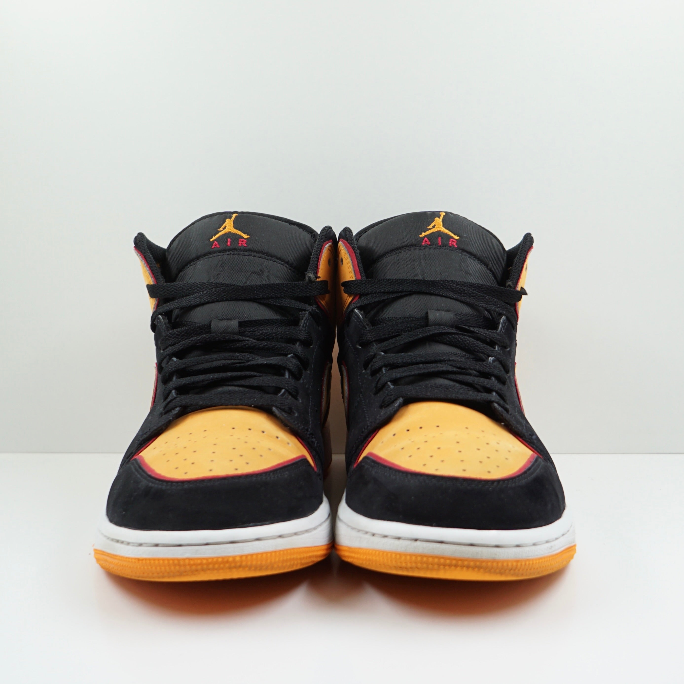 Jordan 1 Mid Fat Tongue Black Orange