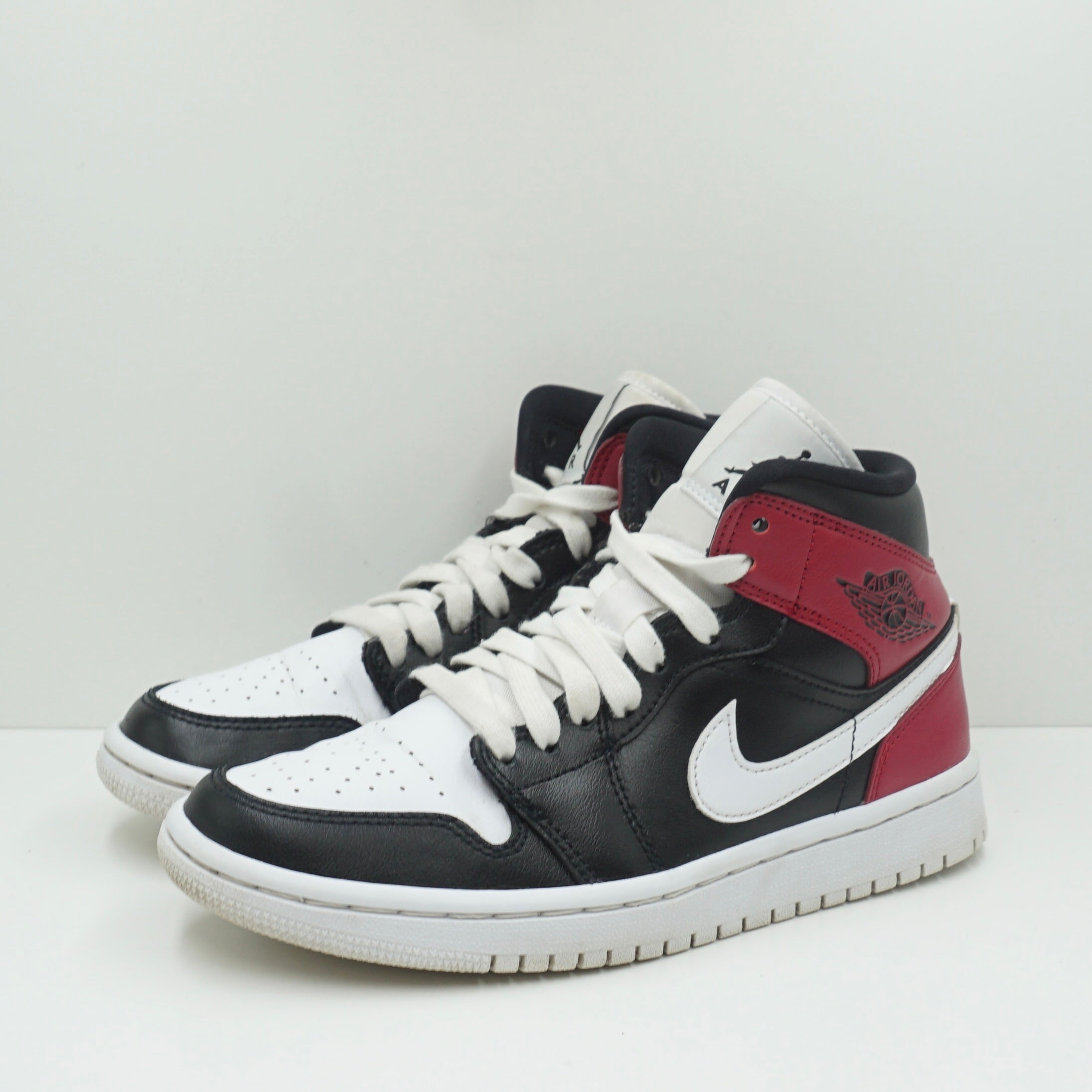 Jordan 1 Mid Black Noble Red (W)