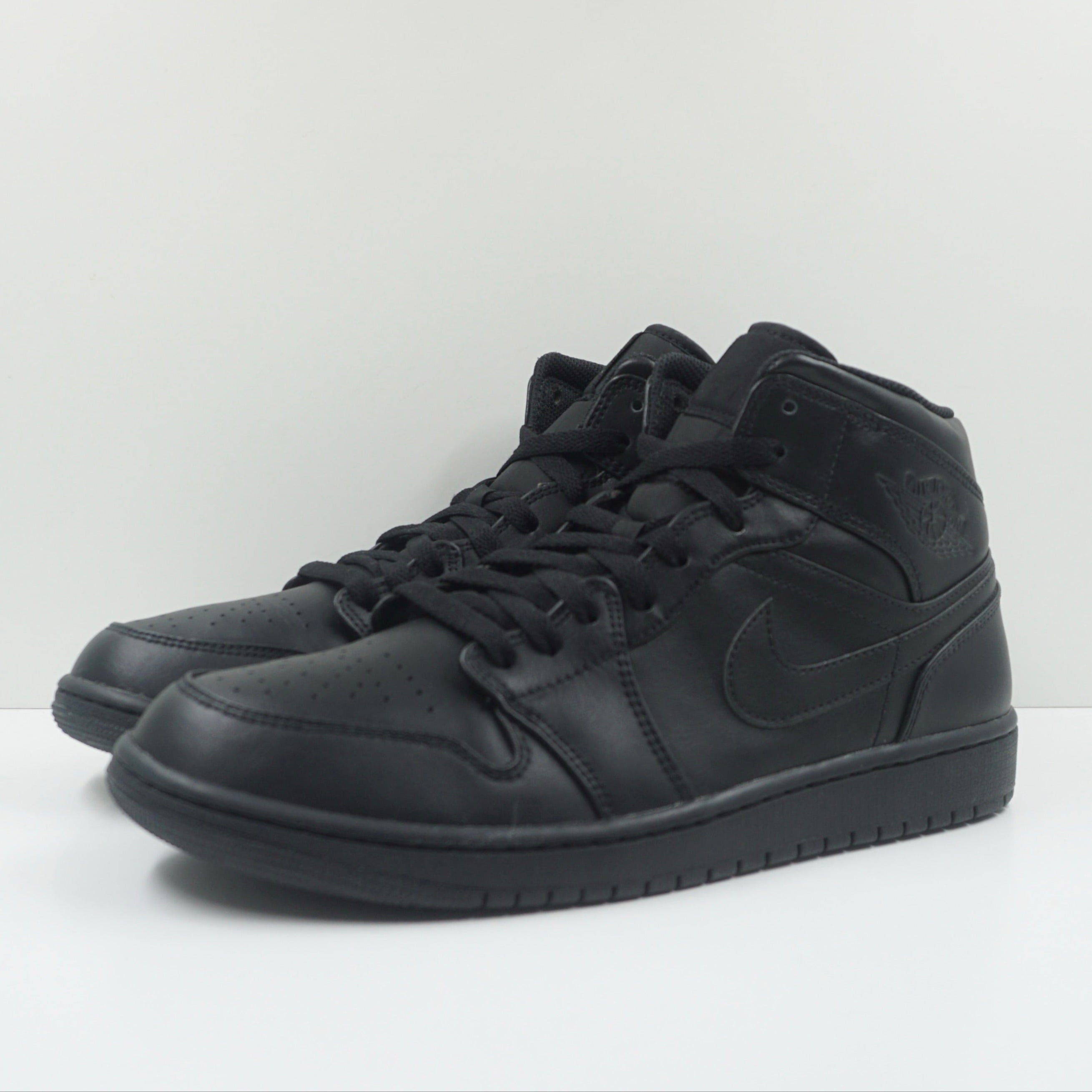 Jordan 1 Mid Triple Black