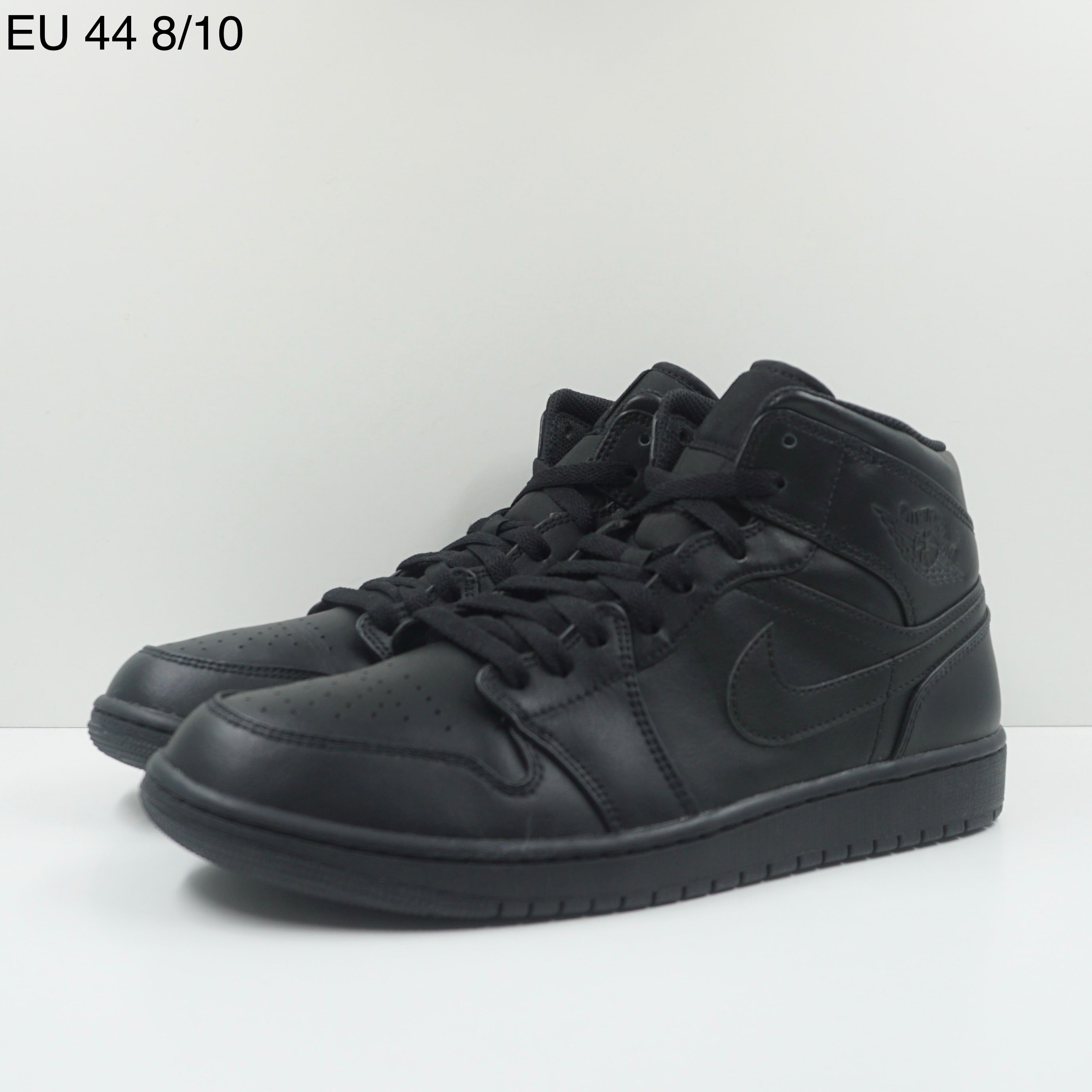 Jordan 1 Mid Triple Black