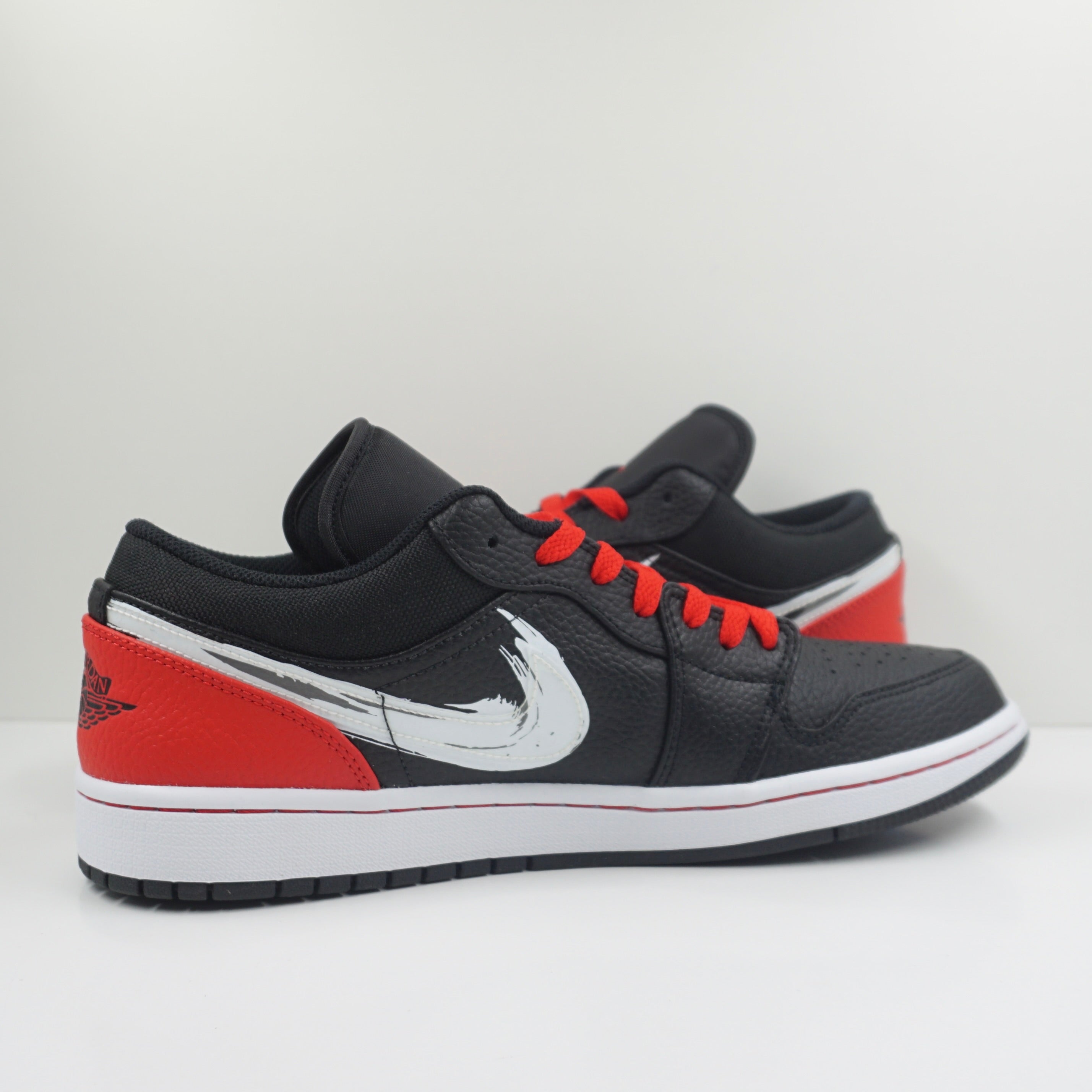 Jordan 1 Low Brushstroke Swoosh Black