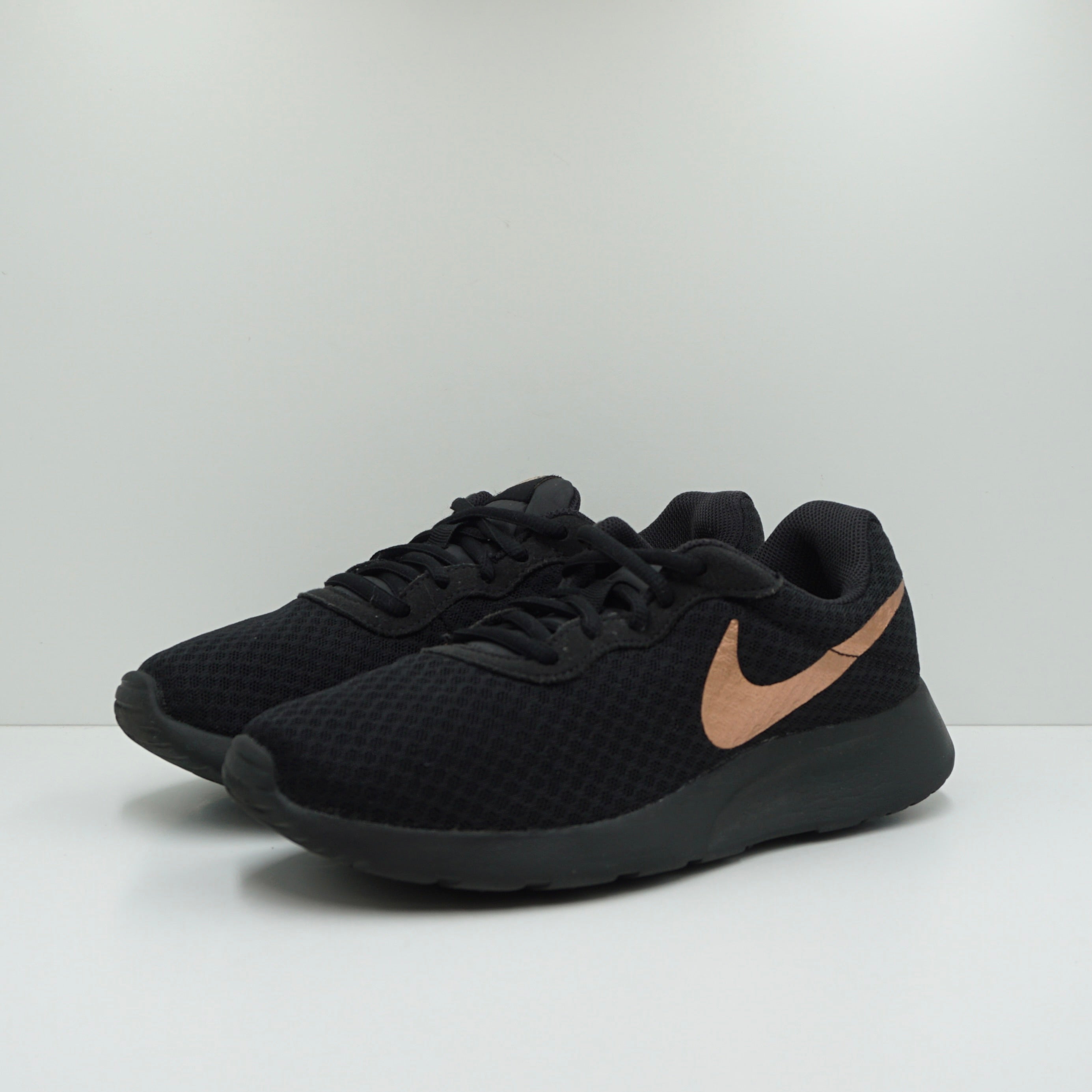 Nike tanjun black bronze hotsell