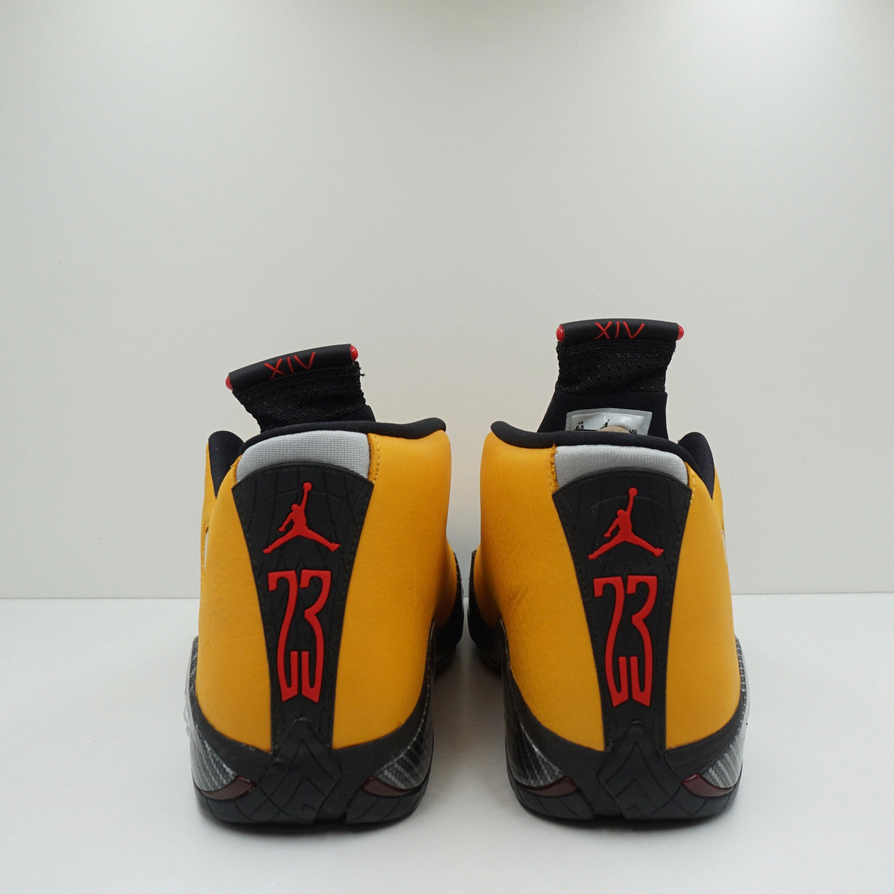 Jordan 14 retro on sale ferrari university gold