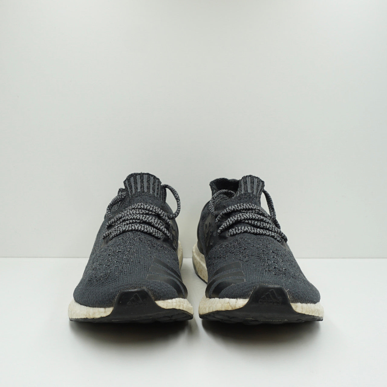 Ultra boost uncaged carbon hotsell core black & grey