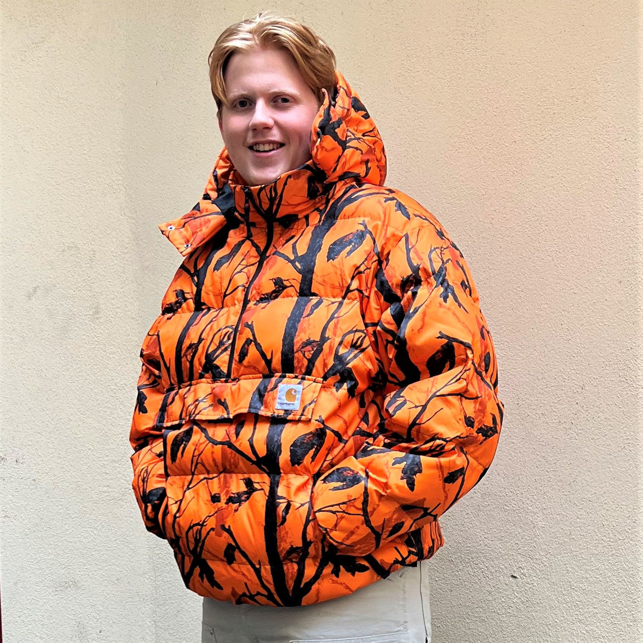 Carhartt wip jones 2025 pullover camo tree orange