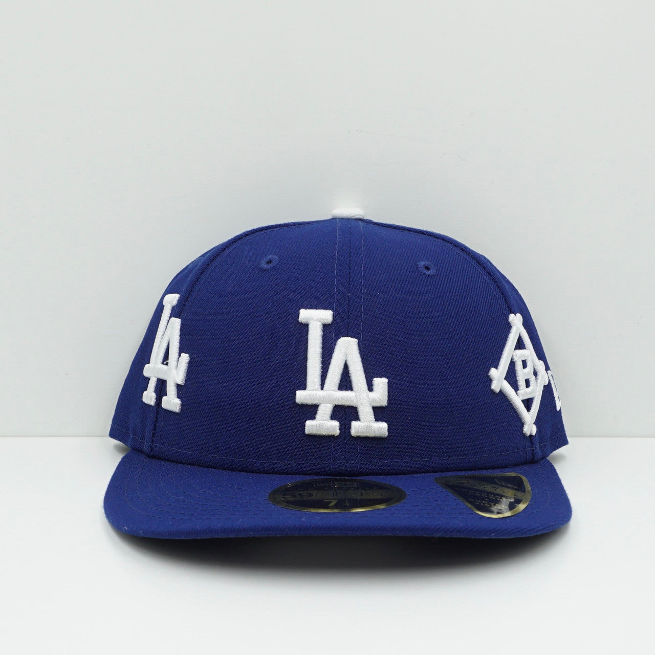 New Era Los Angeles Dodgers All Over Logo Dark Royal Blue Fitted Cap