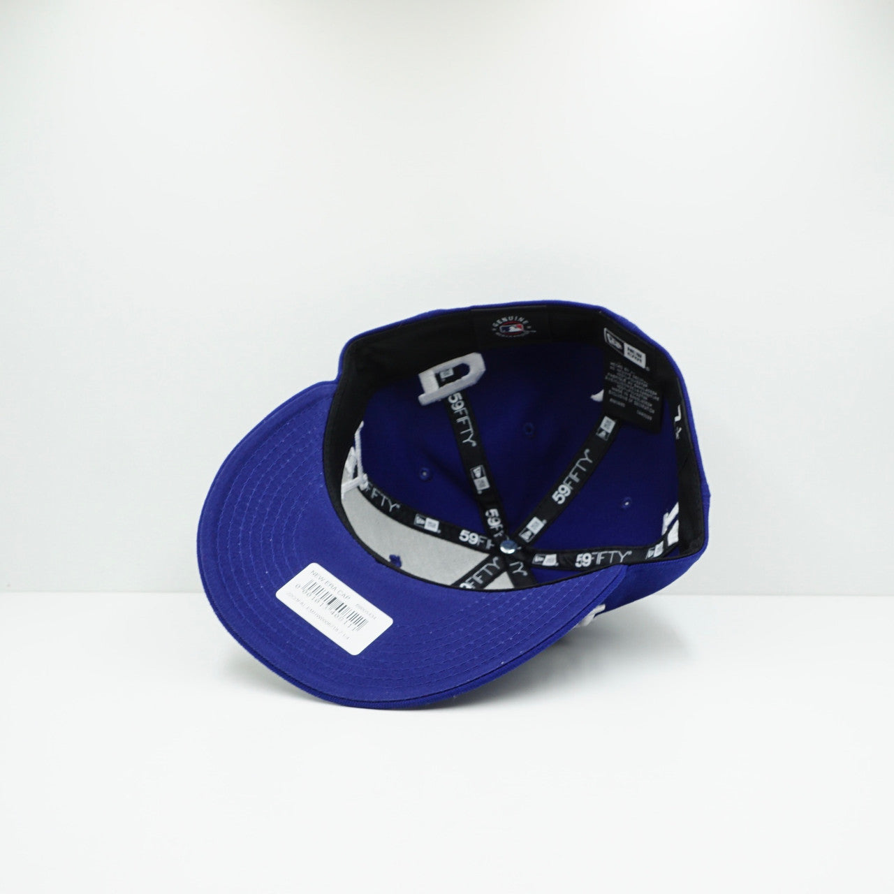 New Era Los Angeles Dodgers All Over Logo Dark Royal Blue Fitted Cap