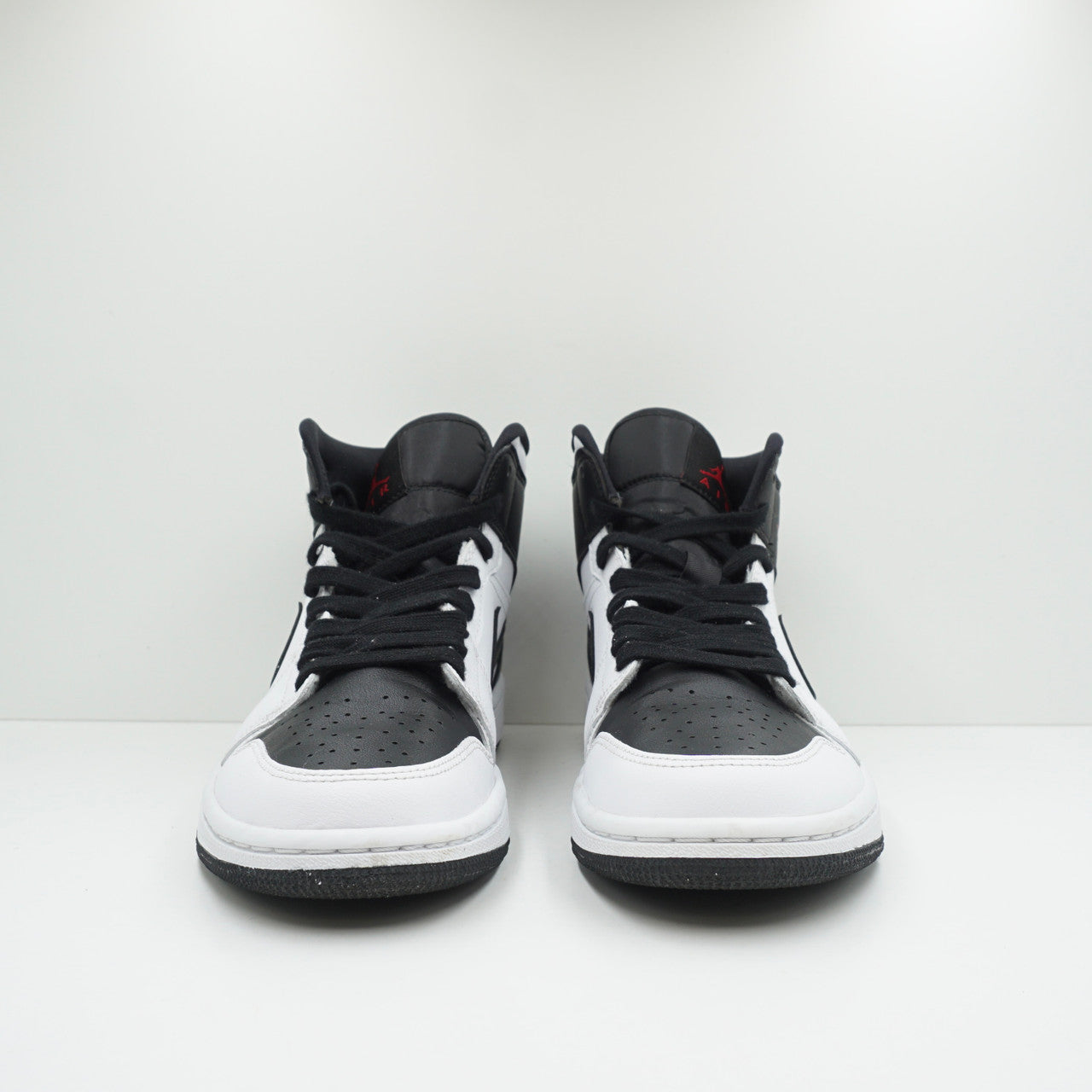 Air jordan 1 outlet mid reverse black toe