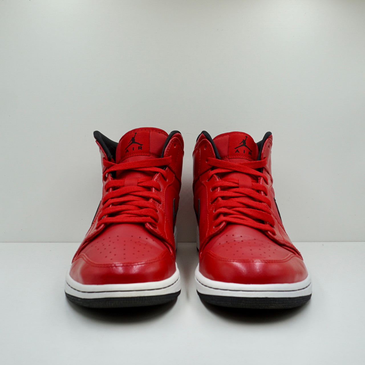 jordan 1 mid gym red black patent