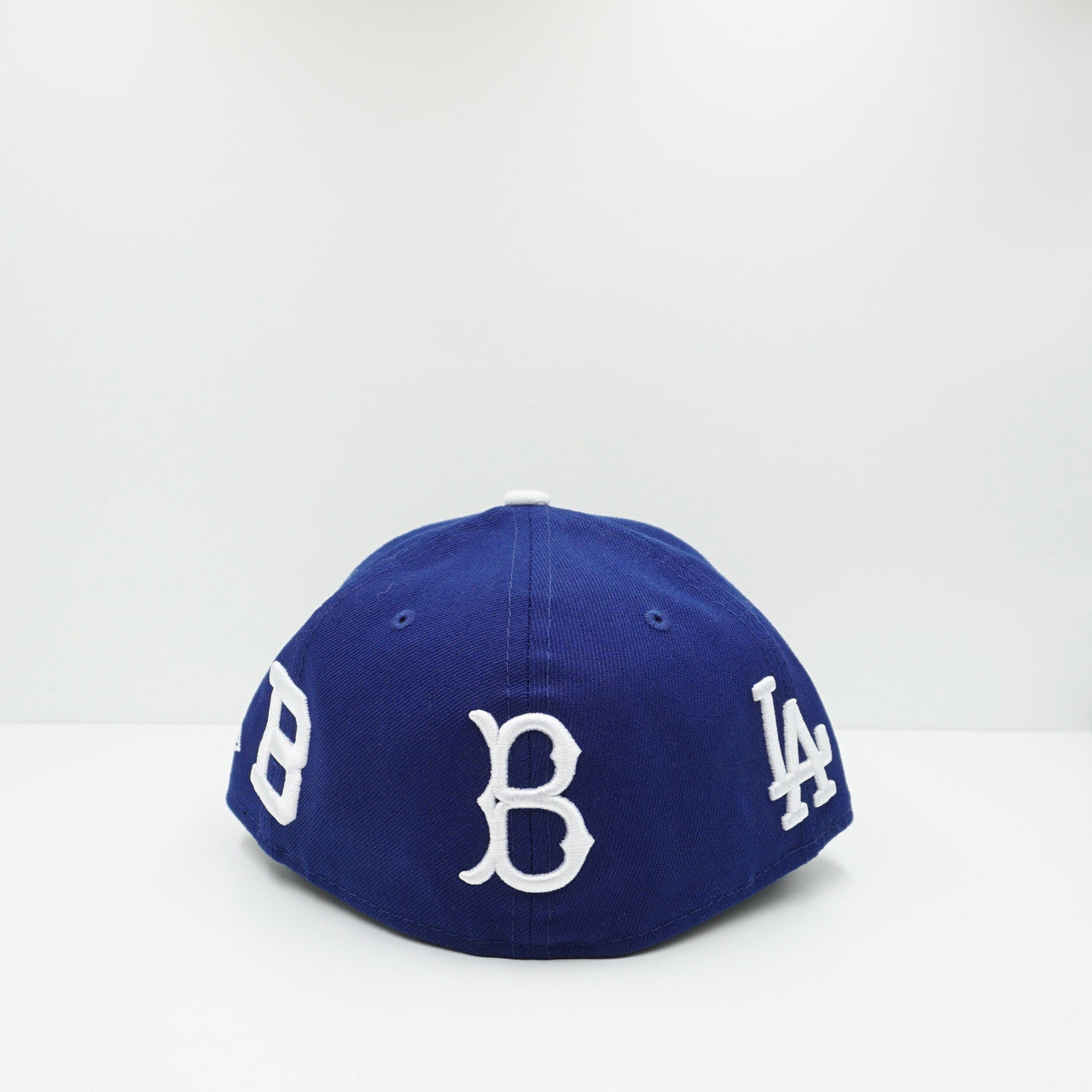 New Era Los Angeles Dodgers All Over Logo Dark Royal Blue Fitted Cap