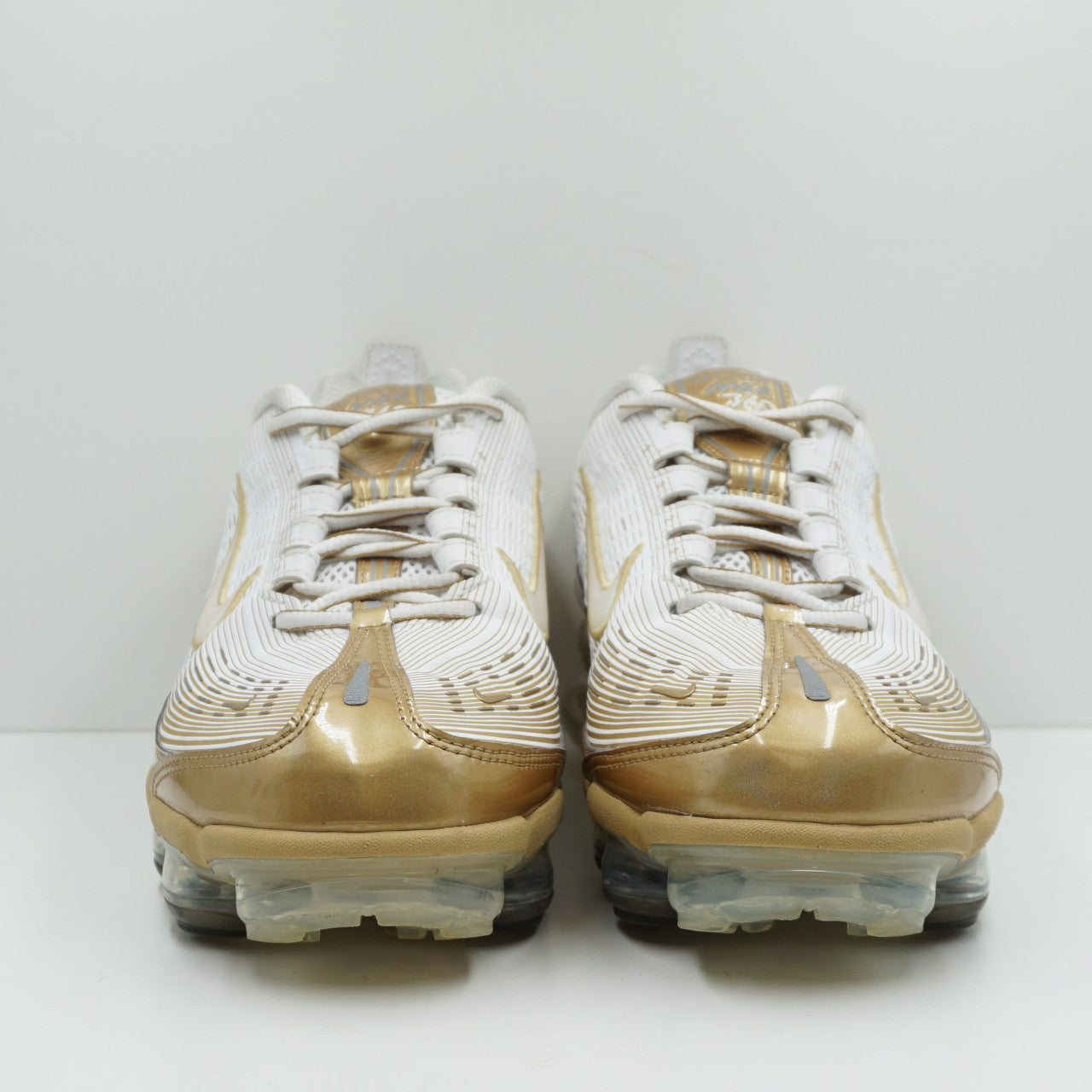 white metallic gold vapormax