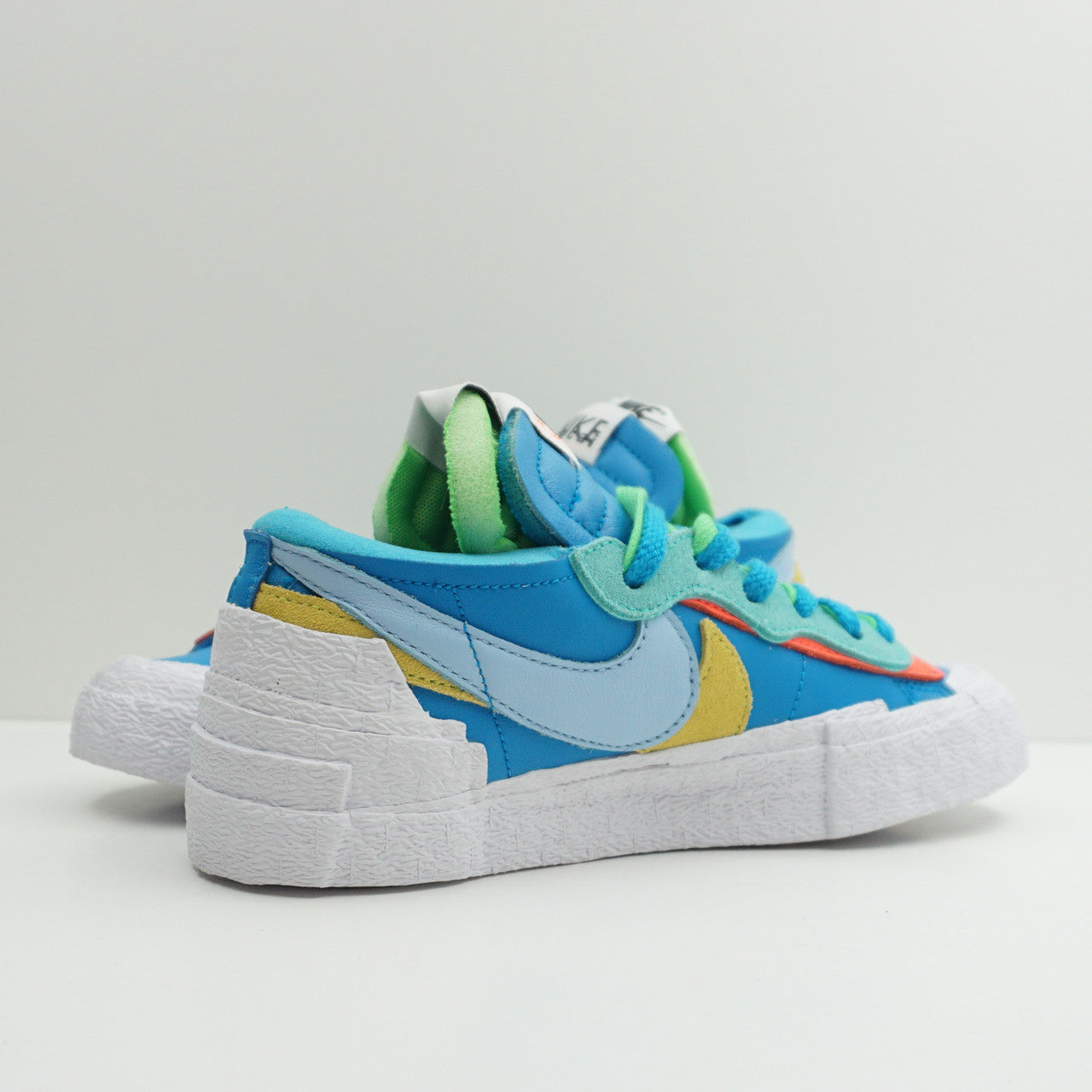 Nike Blazer Low Sacai KAWS Neptune Blue