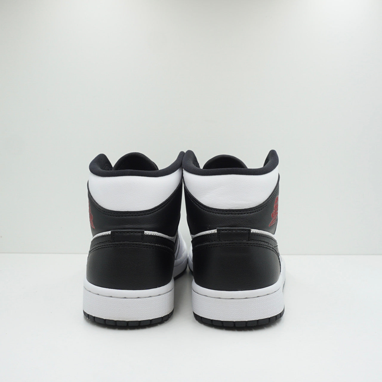 Jordan 1 Mid Reverse Black Toe (W)